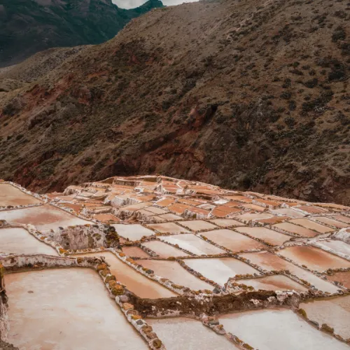 salt mines at sunset in Cusco